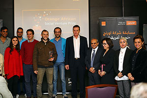 Yves Gauthier, Mobinil Chief Executive Officer and Ashraf Halim Mobinil Chief Commercial Officer with “Bassita” Team , the winner of Orange “Star Africa” Competition first place 
